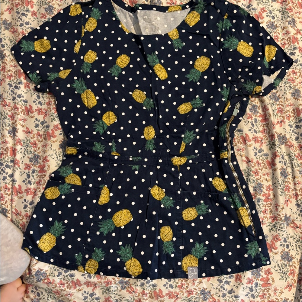 Jaanuu Navy Pineapple peplum scrub top
